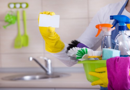 Carpet cleaning team following safe working practices with protective equipment
